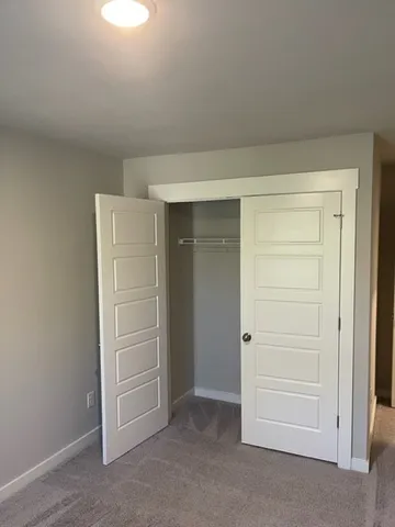 an empty room with closet