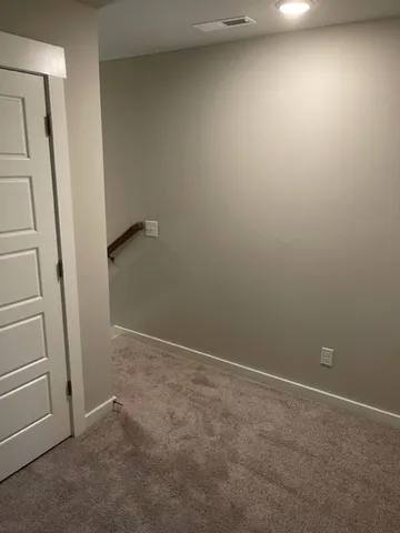 an empty room with a gallery