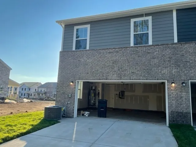 a view of a swimming pool with a yard