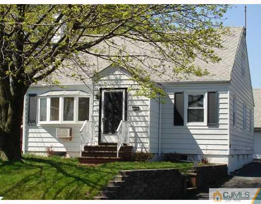 12 Old Post Road Edison, NJ 08817 - Photo 1 of 10 a front view of a house with a yard