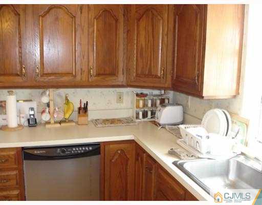 12 Old Post Road Edison, NJ 08817 - Photo 2 of 10 a kitchen with a sink and cabinets
