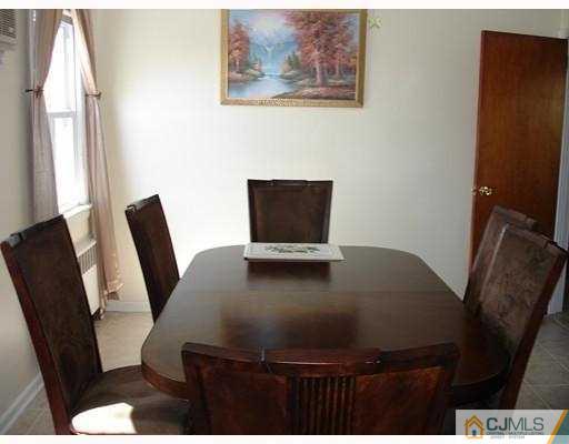 12 Old Post Road Edison, NJ 08817 - Photo 3 of 10 a view of a workspace with furniture and wooden floor