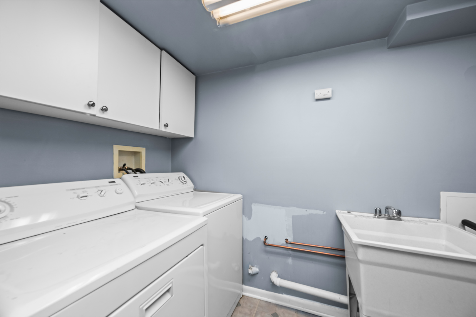 1414 Indigo Drive Mount Prospect, IL 60056 - Photo 19 of 32 a utility room with dryer and washer