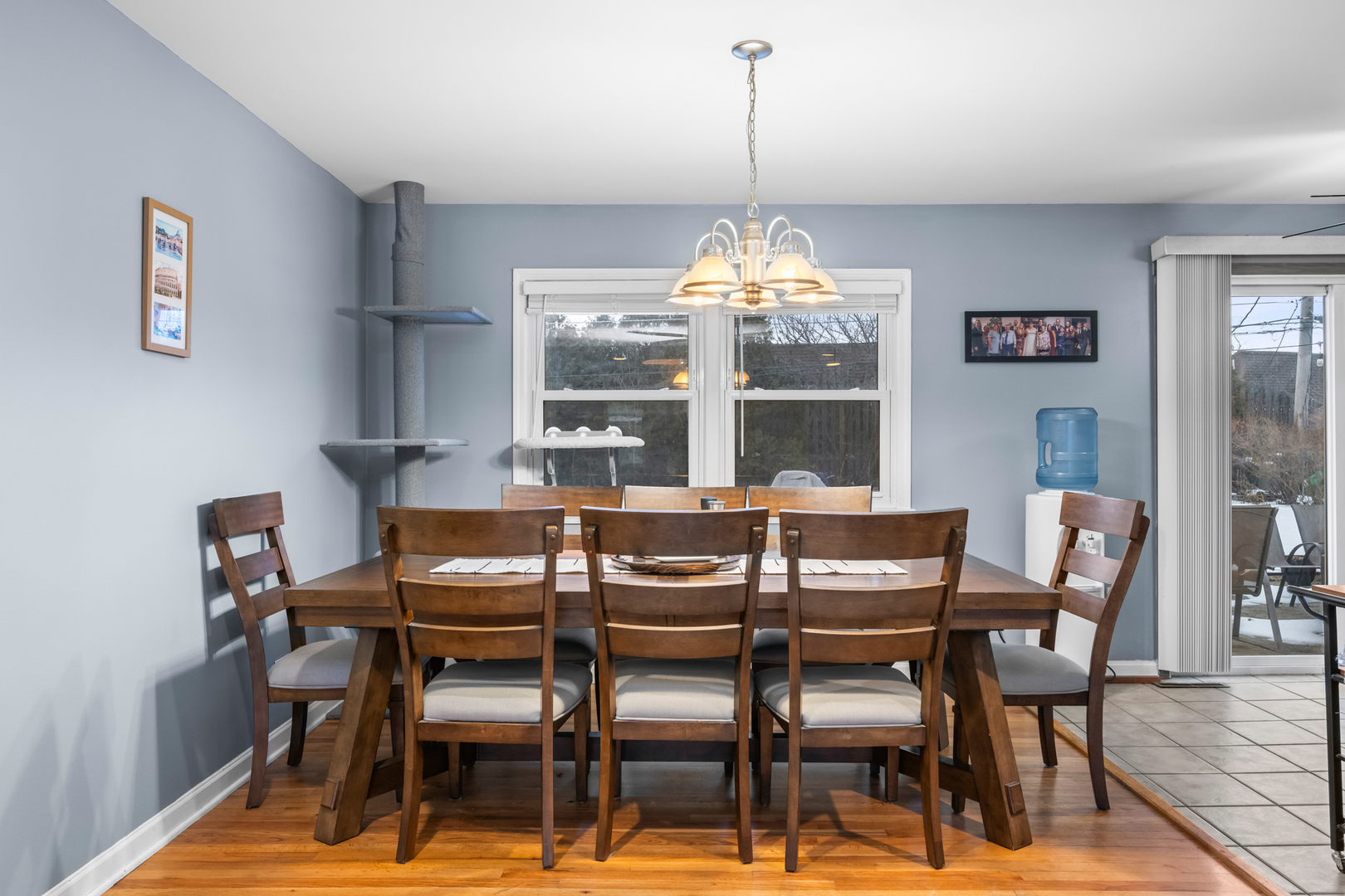 1414 Indigo Drive Mount Prospect, IL 60056 - Photo 5 of 32 a view of a dining room with furniture wooden floor and chandelier