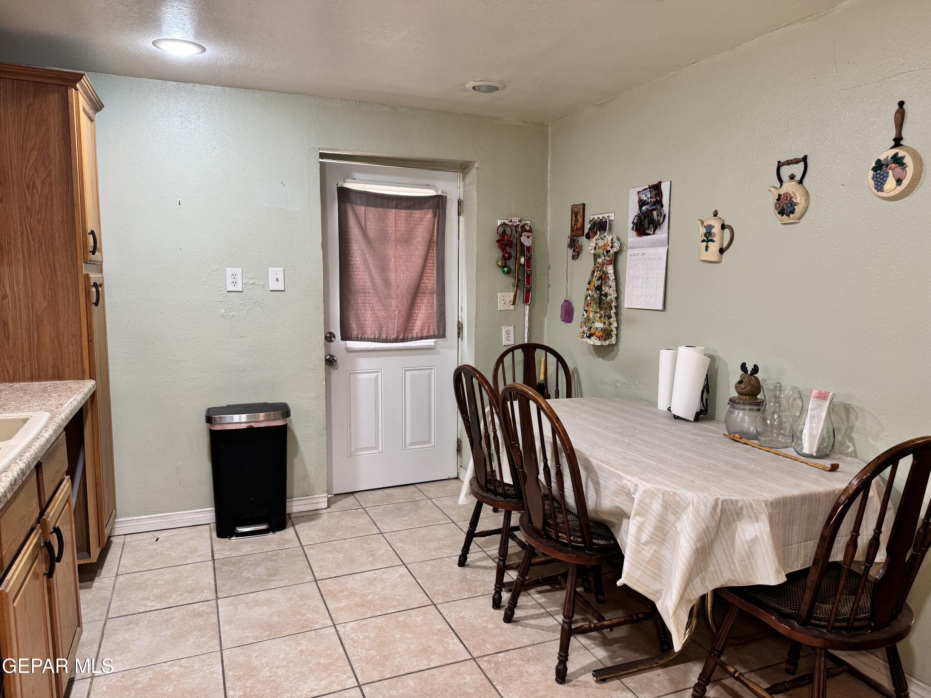 316 St Anthony Street Anthony, NM 88021 - Photo 11 of 29 a view of a dining room with furniture