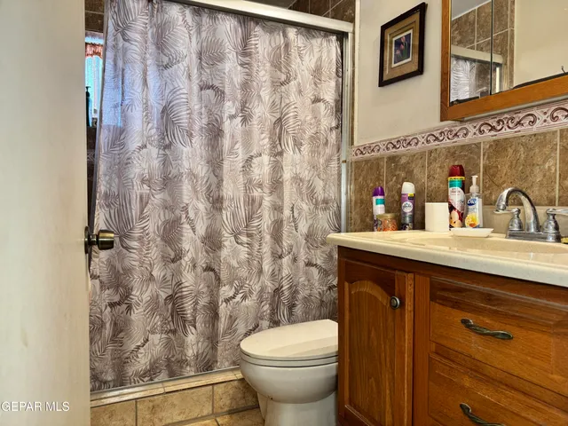 a bathroom with a sink and a toilet