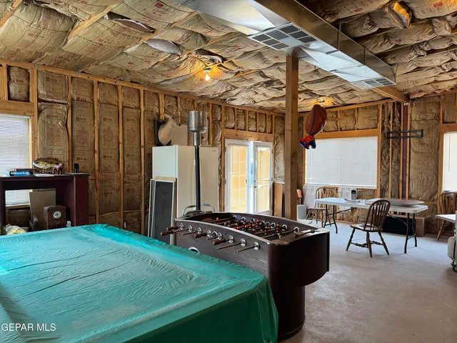 a black leather couch in front of a building