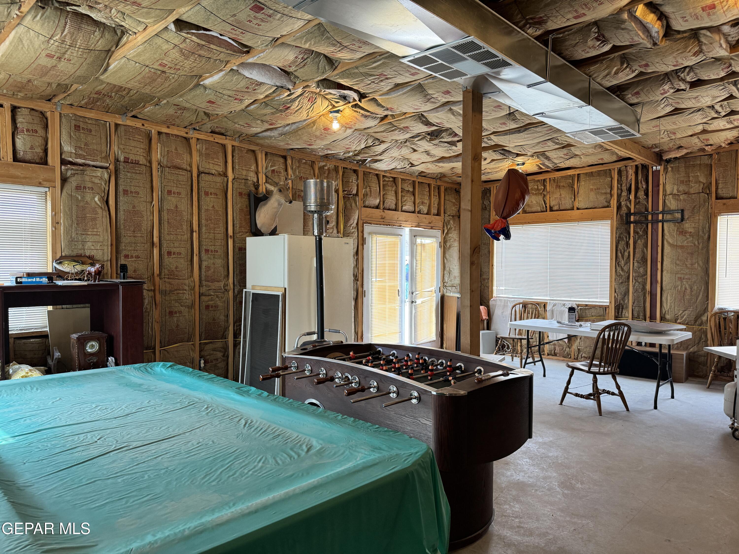 316 St Anthony Street Anthony, NM 88021 - Photo 25 of 29 a black leather couch in front of a building