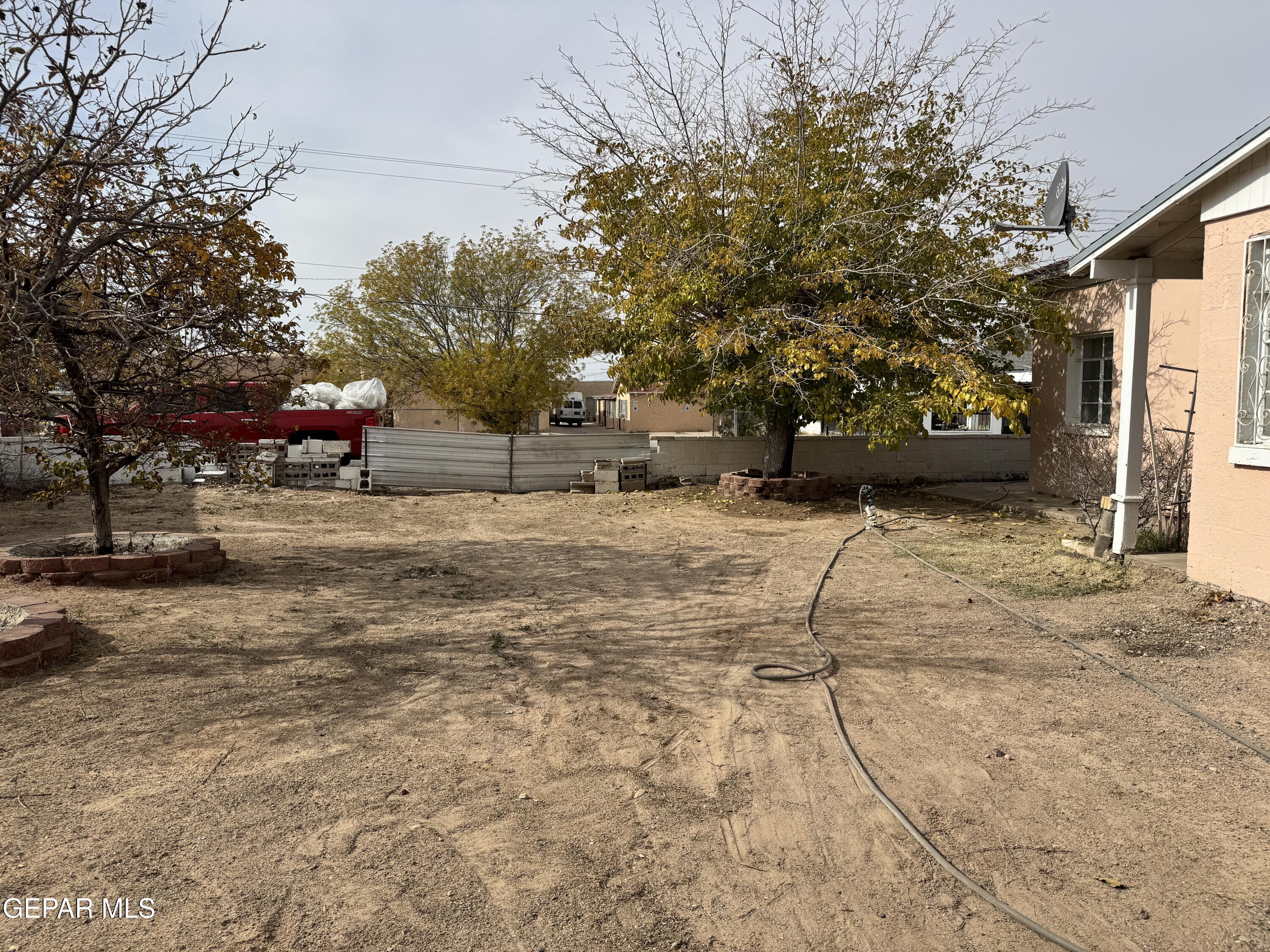 316 St Anthony Street Anthony, NM 88021 - Photo 29 of 29 a view of a yard with a tree