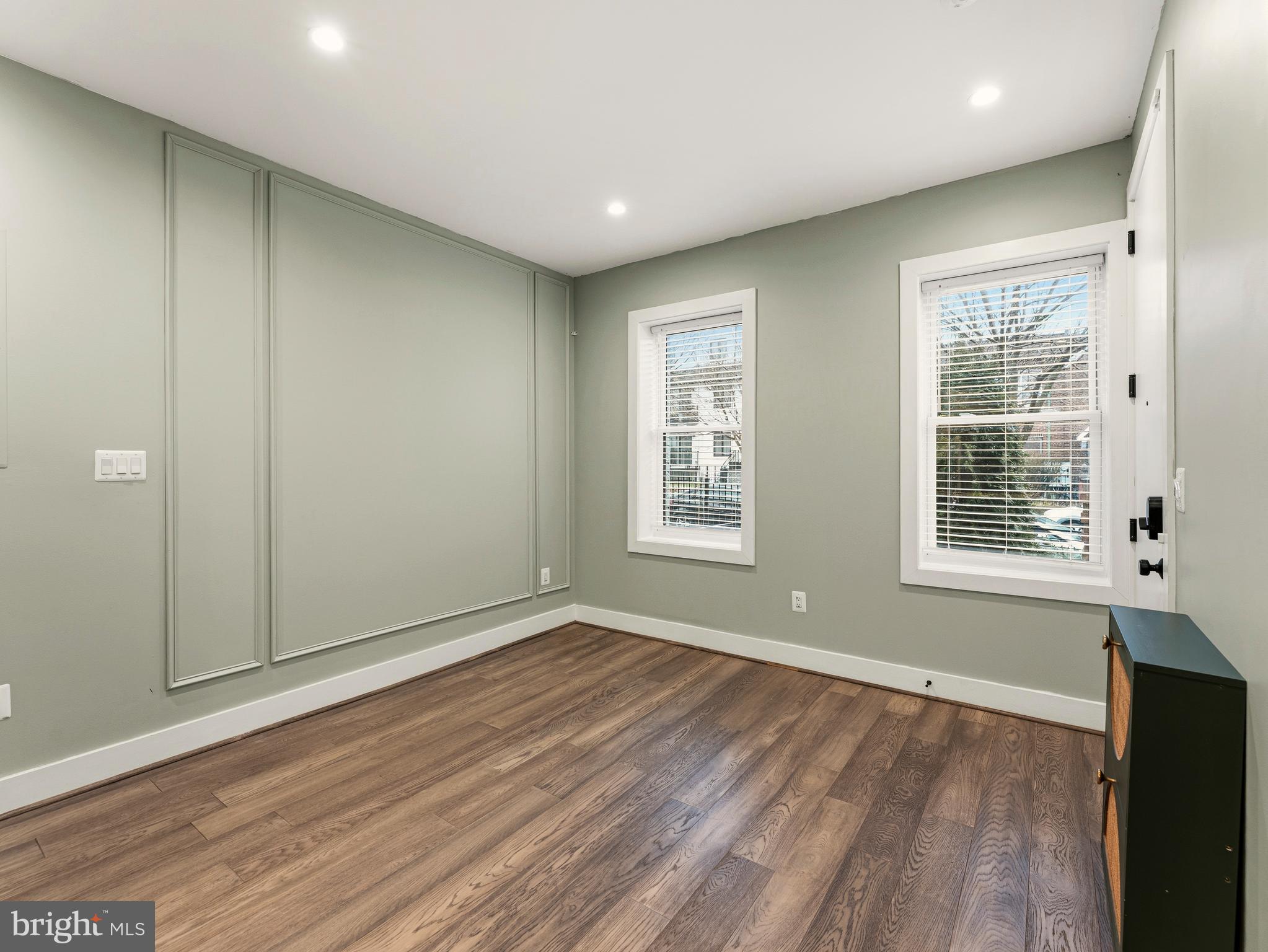 1120 Penn Street Northeast, Unit 2 Washington, DC 20002 - Photo 3 of 14 wooden floor in an empty room with a window