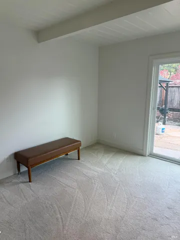 a view of a room with furniture