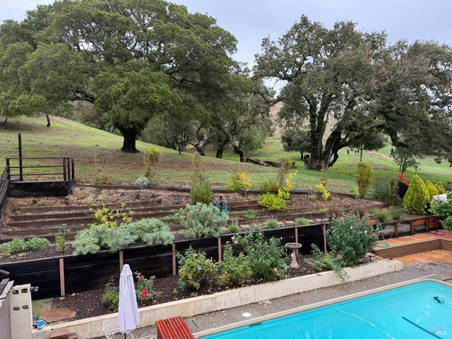 an outdoor space with lots of green space