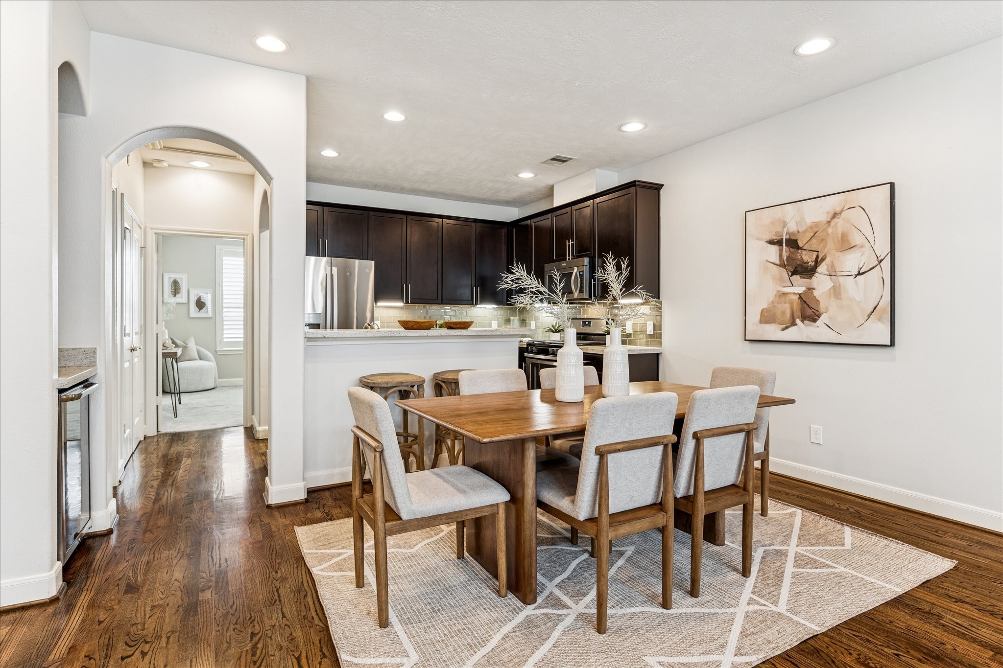 1216 Sampson Street Houston, TX 77003 - Photo 21 of 36 a view of a dining room with furniture and wooden floor