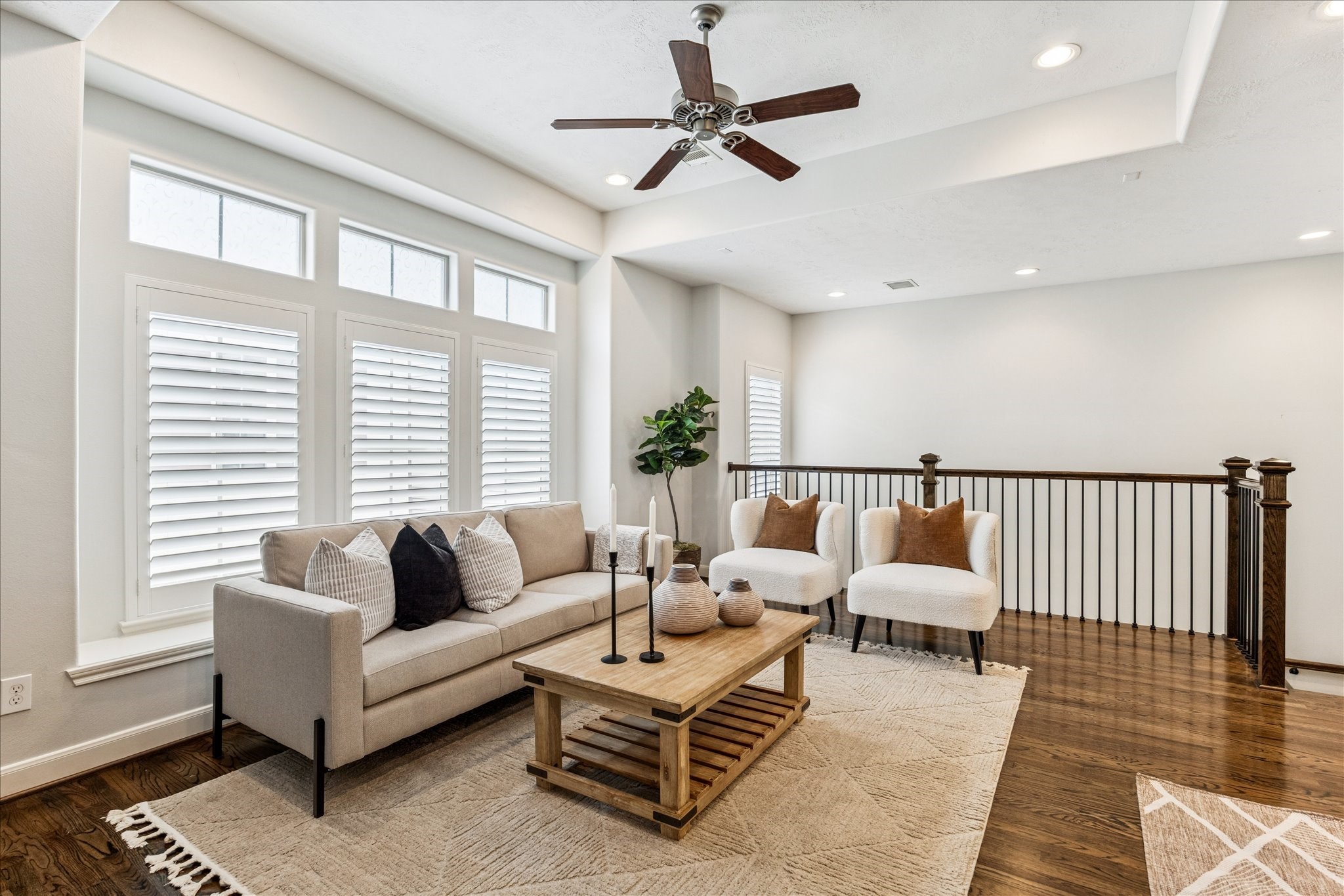 1216 Sampson Street Houston, TX 77003 - Photo 23 of 36 a living room with furniture ceiling fan and a window