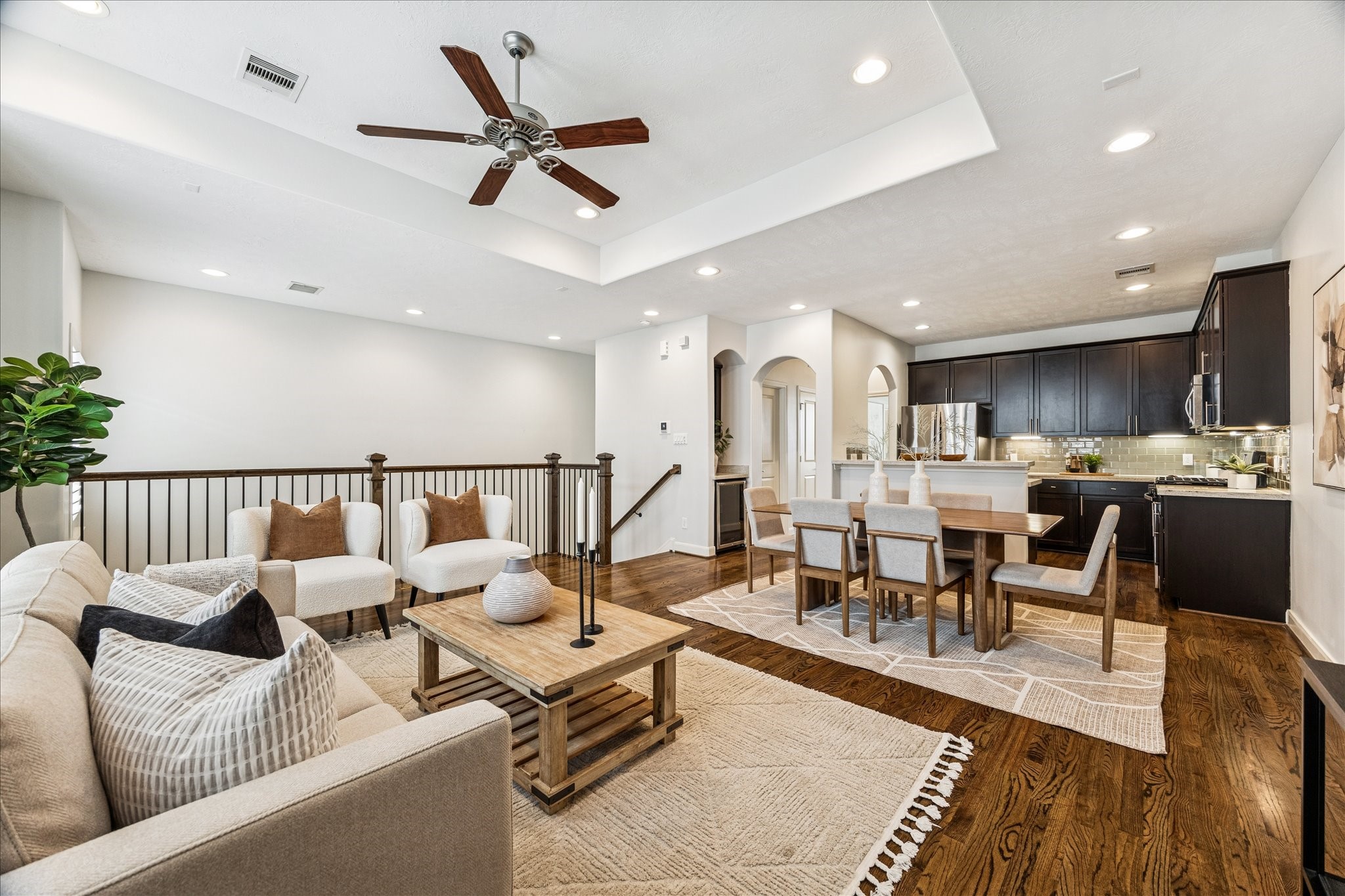1216 Sampson Street Houston, TX 77003 - Photo 24 of 36 a living room with lots of furniture and view of kitchen