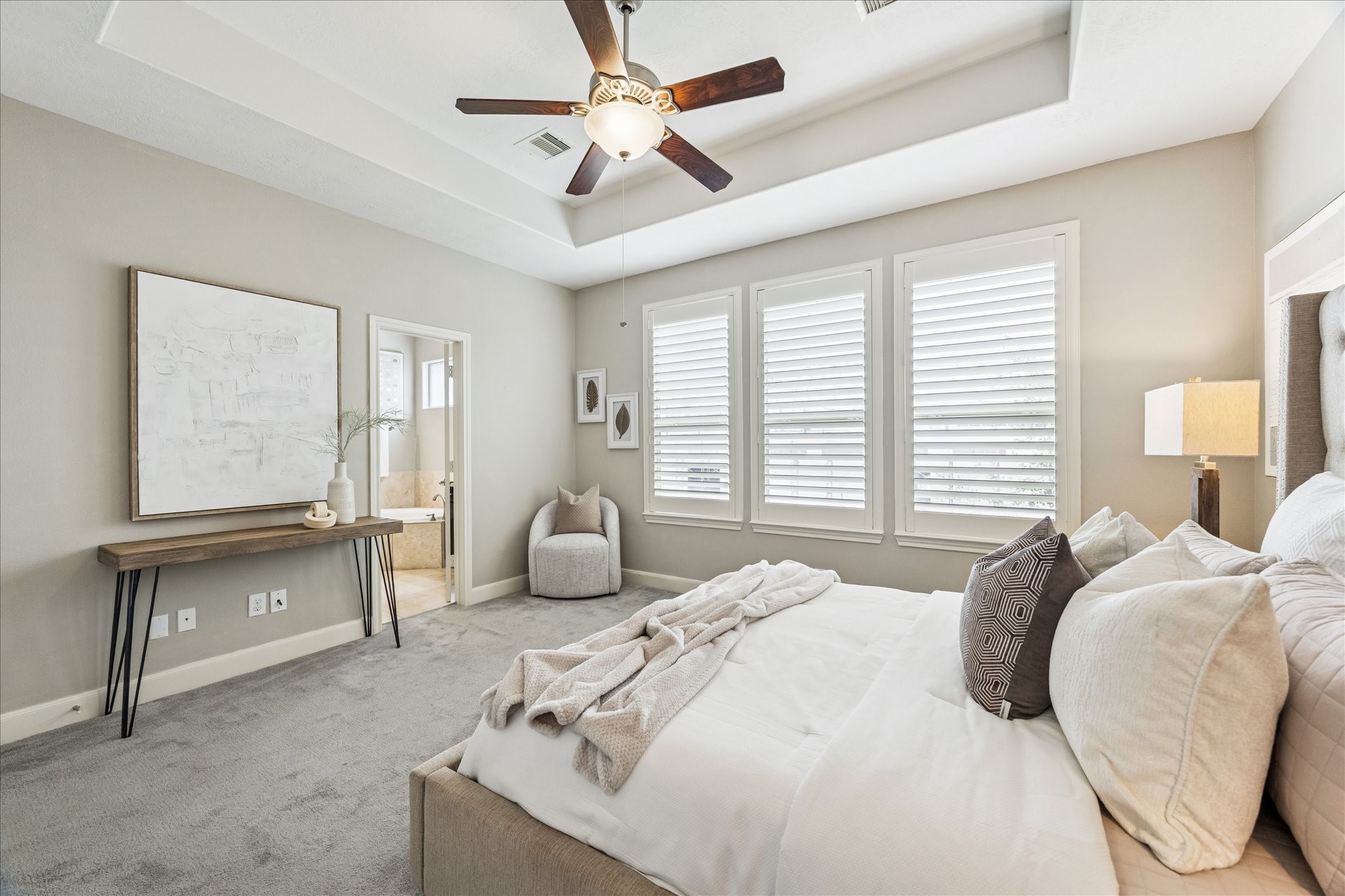 1216 Sampson Street Houston, TX 77003 - Photo 27 of 36 a bedroom with a large bed and large window