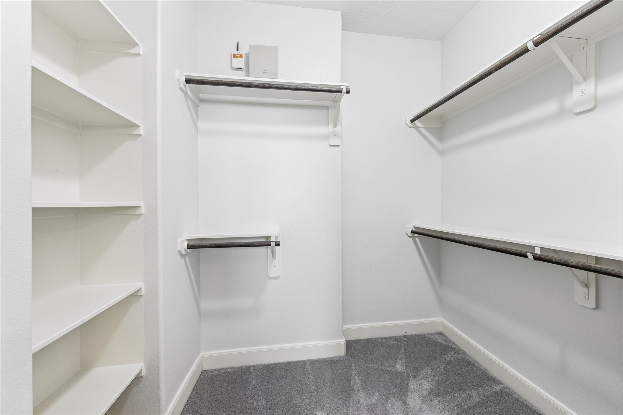1216 Sampson Street Houston, TX 77003 - Photo 30 of 36 a view of walk in closet with empty racks