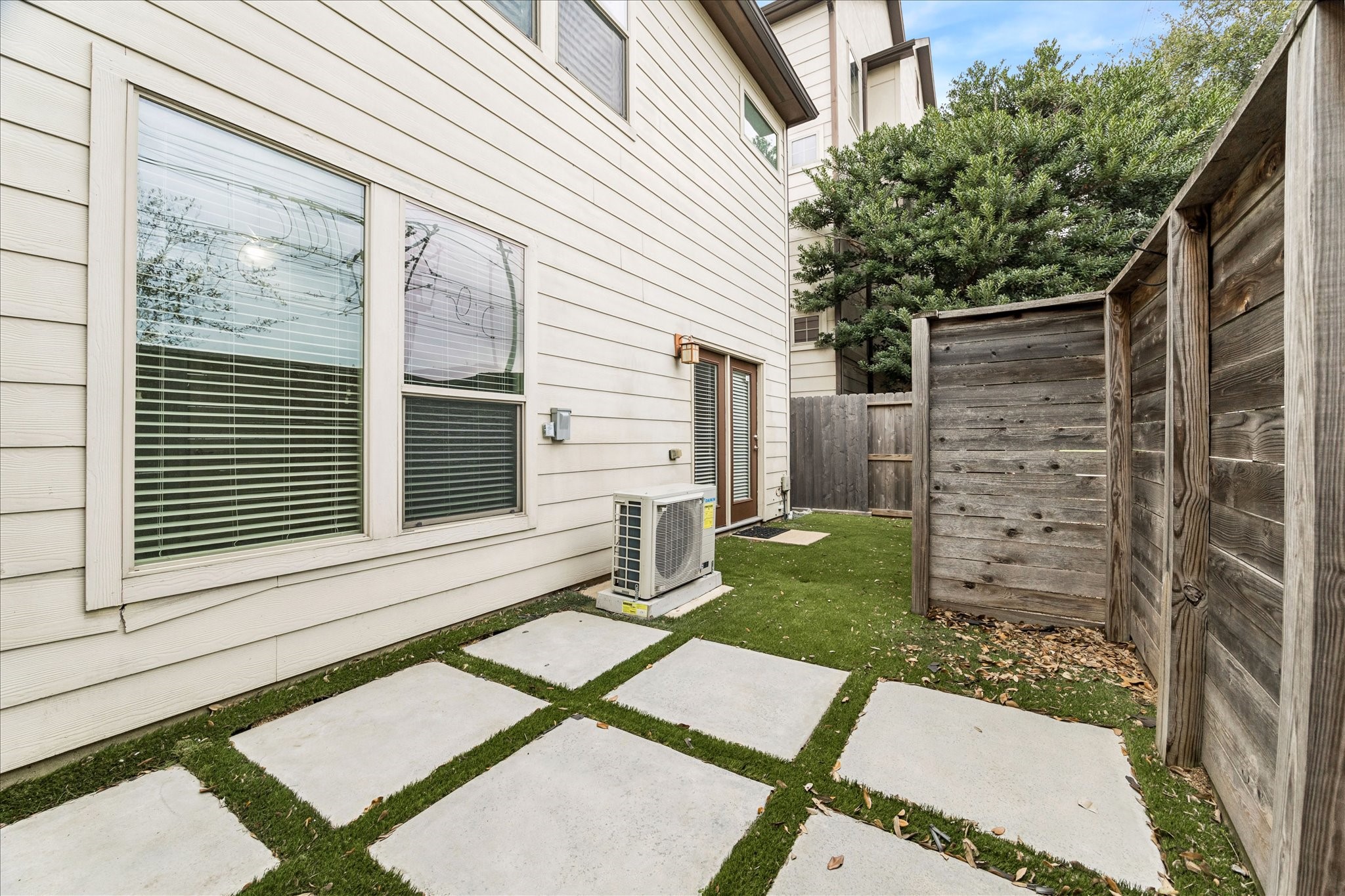 1216 Sampson Street Houston, TX 77003 - Photo 33 of 36 a view of a house with a backyard