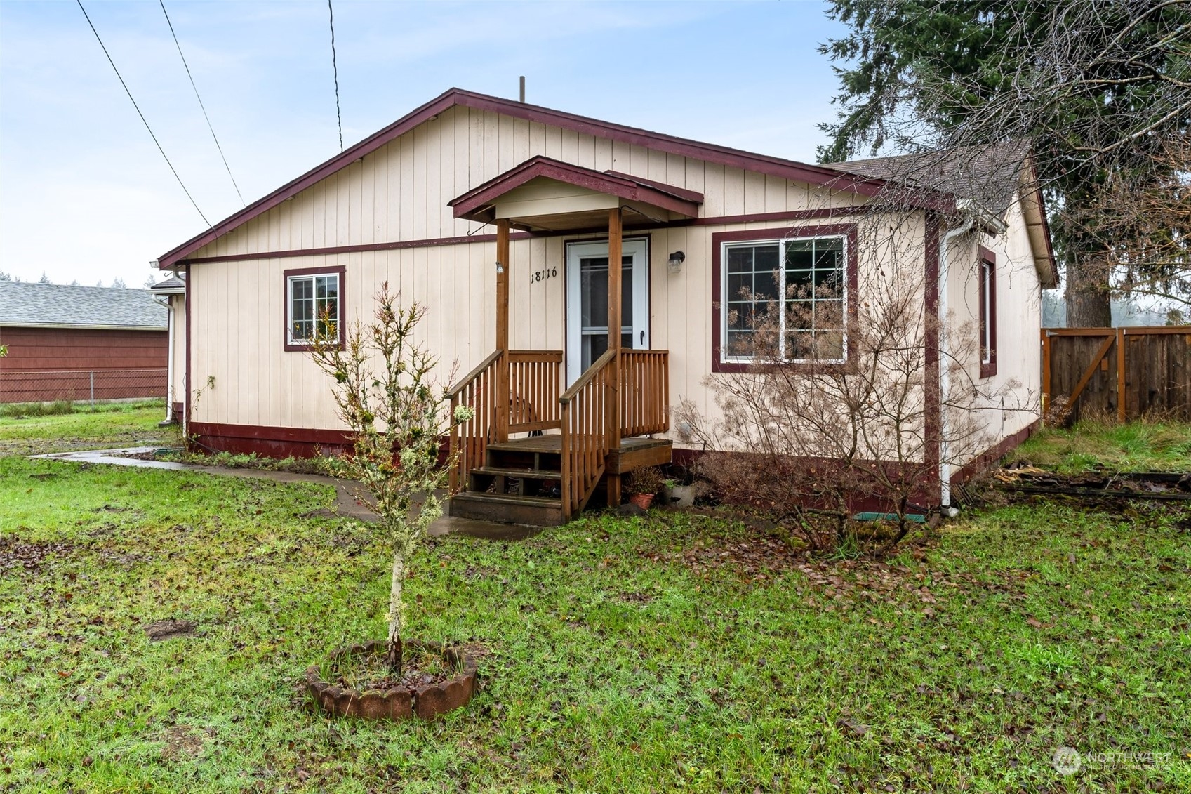 18116 Corvallis Street Southwest Rochester, WA 98579 - Photo 1 of 26 a view of a house with backyard sitting area and garden