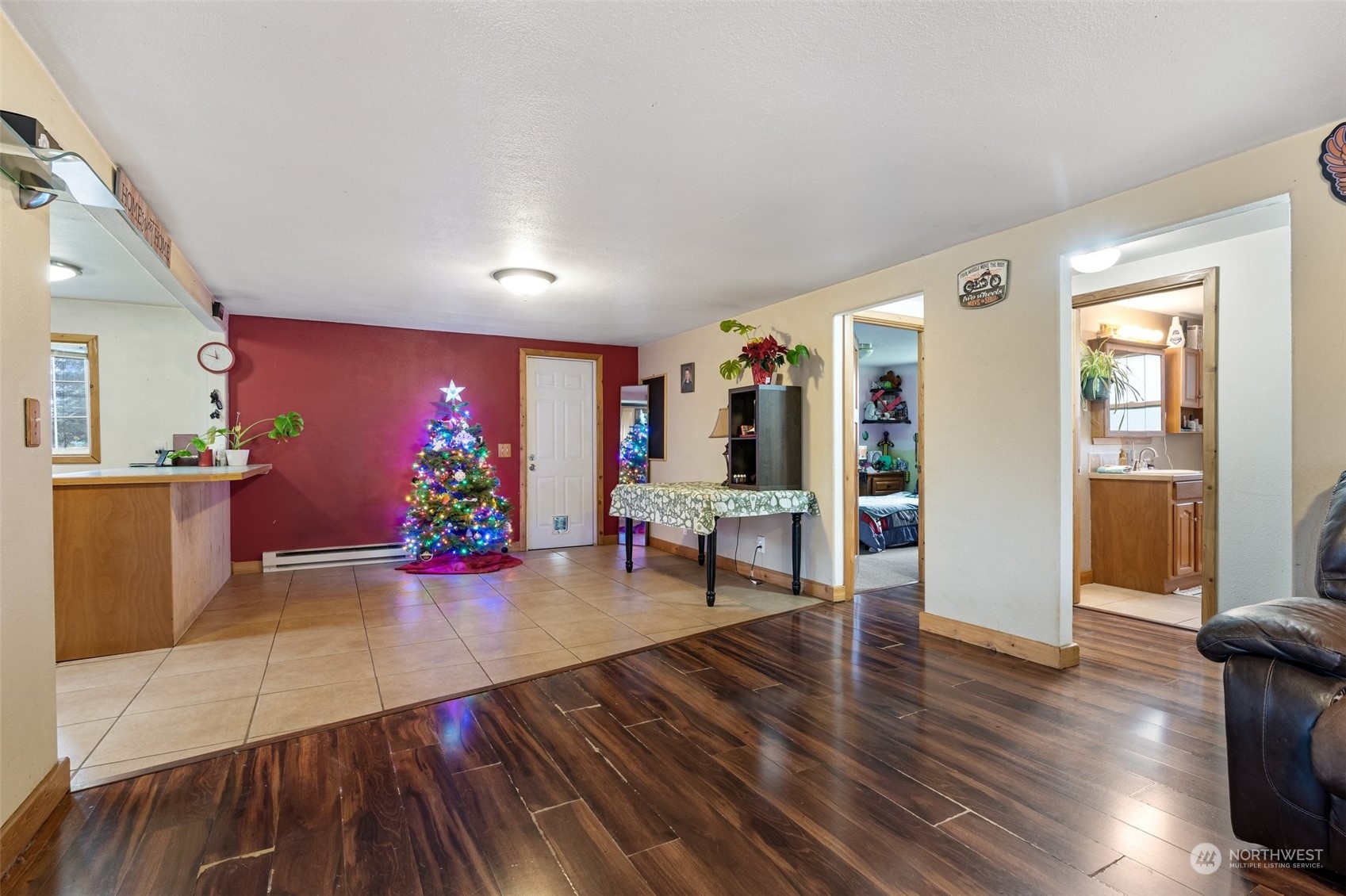 18116 Corvallis Street Southwest Rochester, WA 98579 - Photo 17 of 26 a living room with furniture and wooden floor