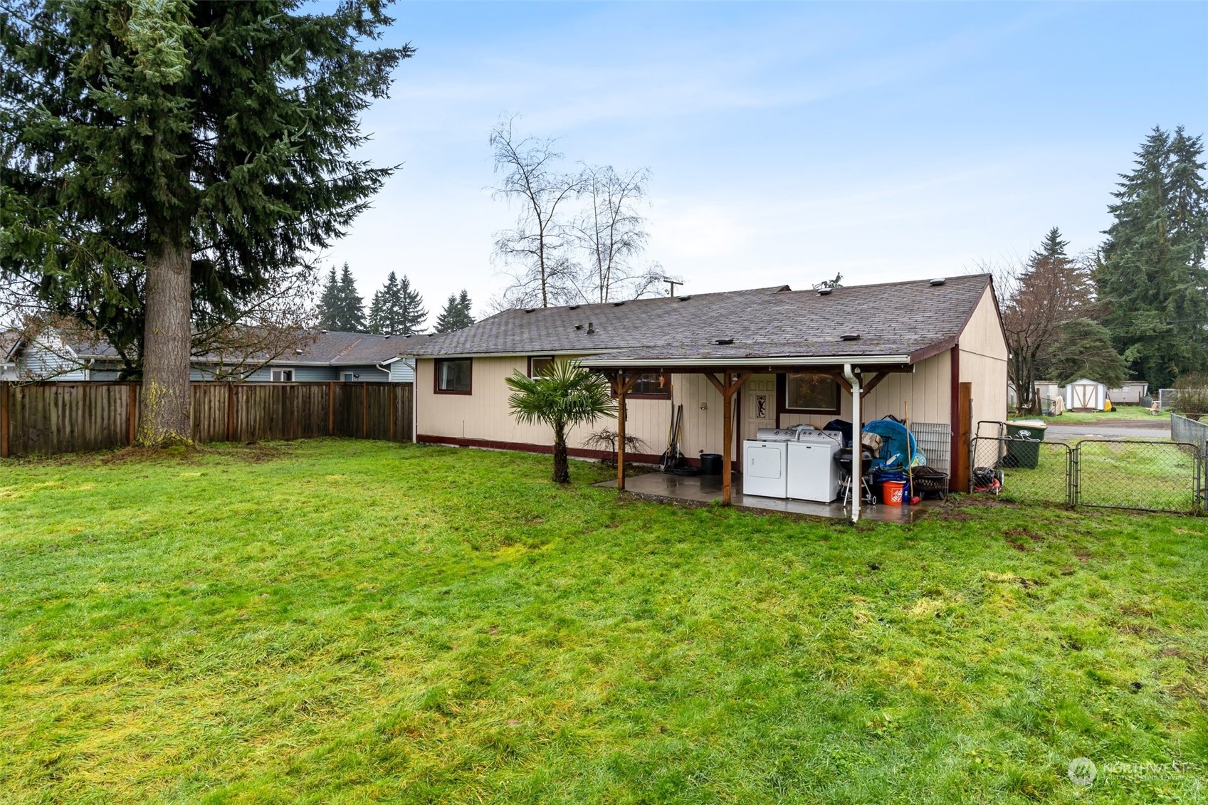 18116 Corvallis Street Southwest Rochester, WA 98579 - Photo 23 of 26 a view of a house with a yard and sitting area