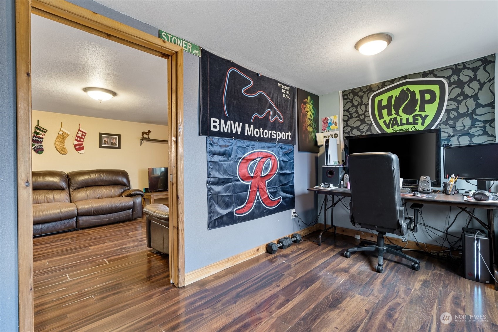 18116 Corvallis Street Southwest Rochester, WA 98579 - Photo 8 of 26 a work room with furniture and wooden floor
