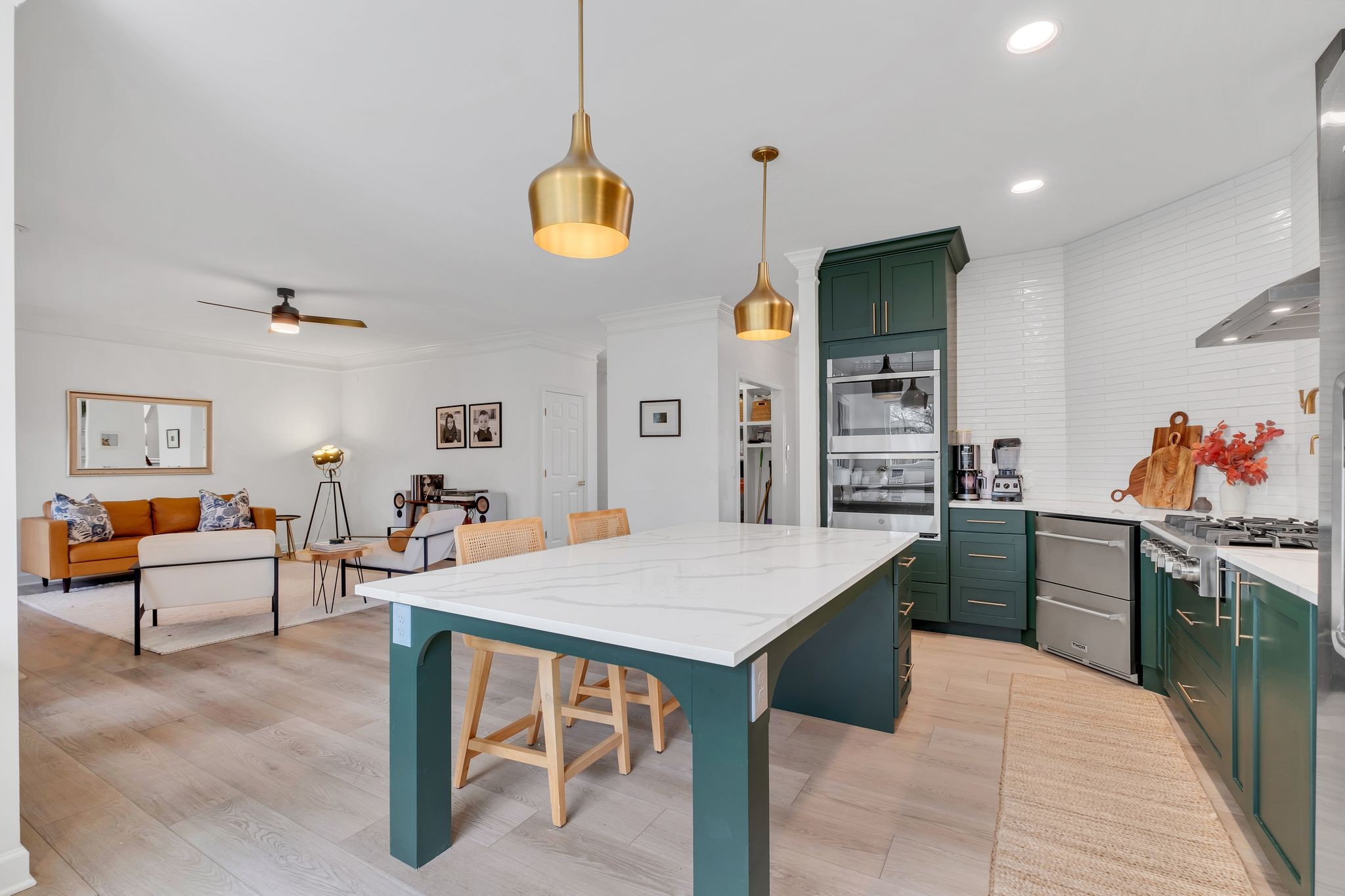 378 Logans Circle Franklin, TN 37067 - Photo 14 of 49 a large kitchen with a table and chairs in it