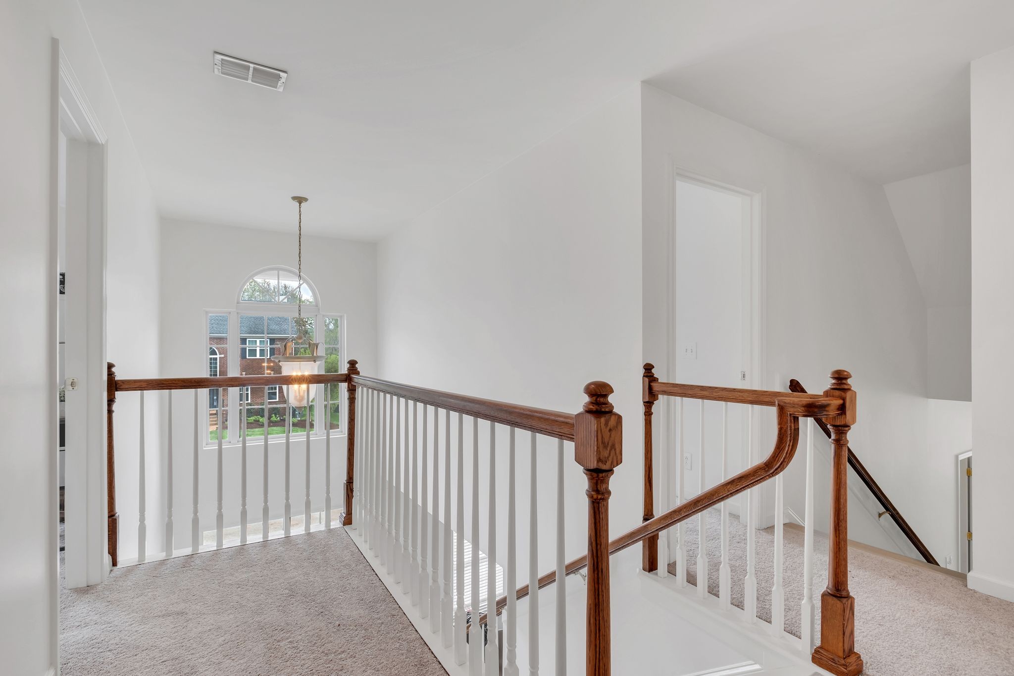 378 Logans Circle Franklin, TN 37067 - Photo 28 of 49 a view of a hallway with a chandelier