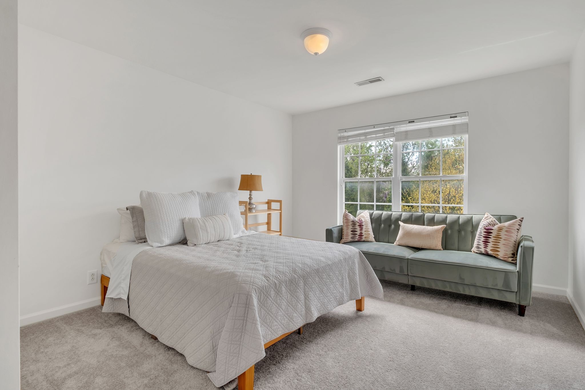 378 Logans Circle Franklin, TN 37067 - Photo 35 of 49 a bedroom with a bed and a couch