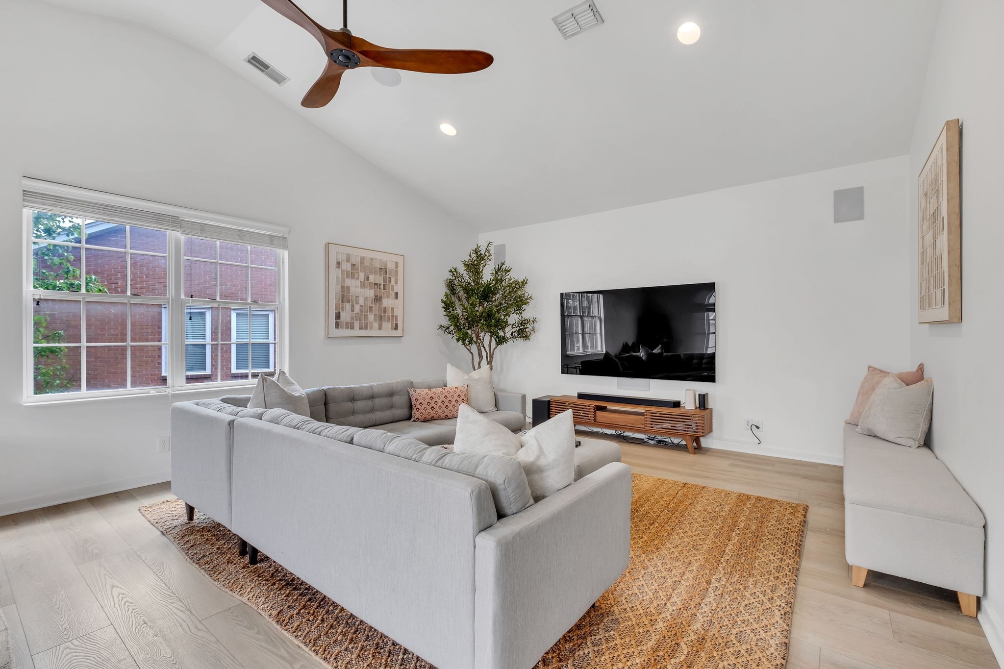 378 Logans Circle Franklin, TN 37067 - Photo 41 of 49 a living room with furniture and a flat screen tv