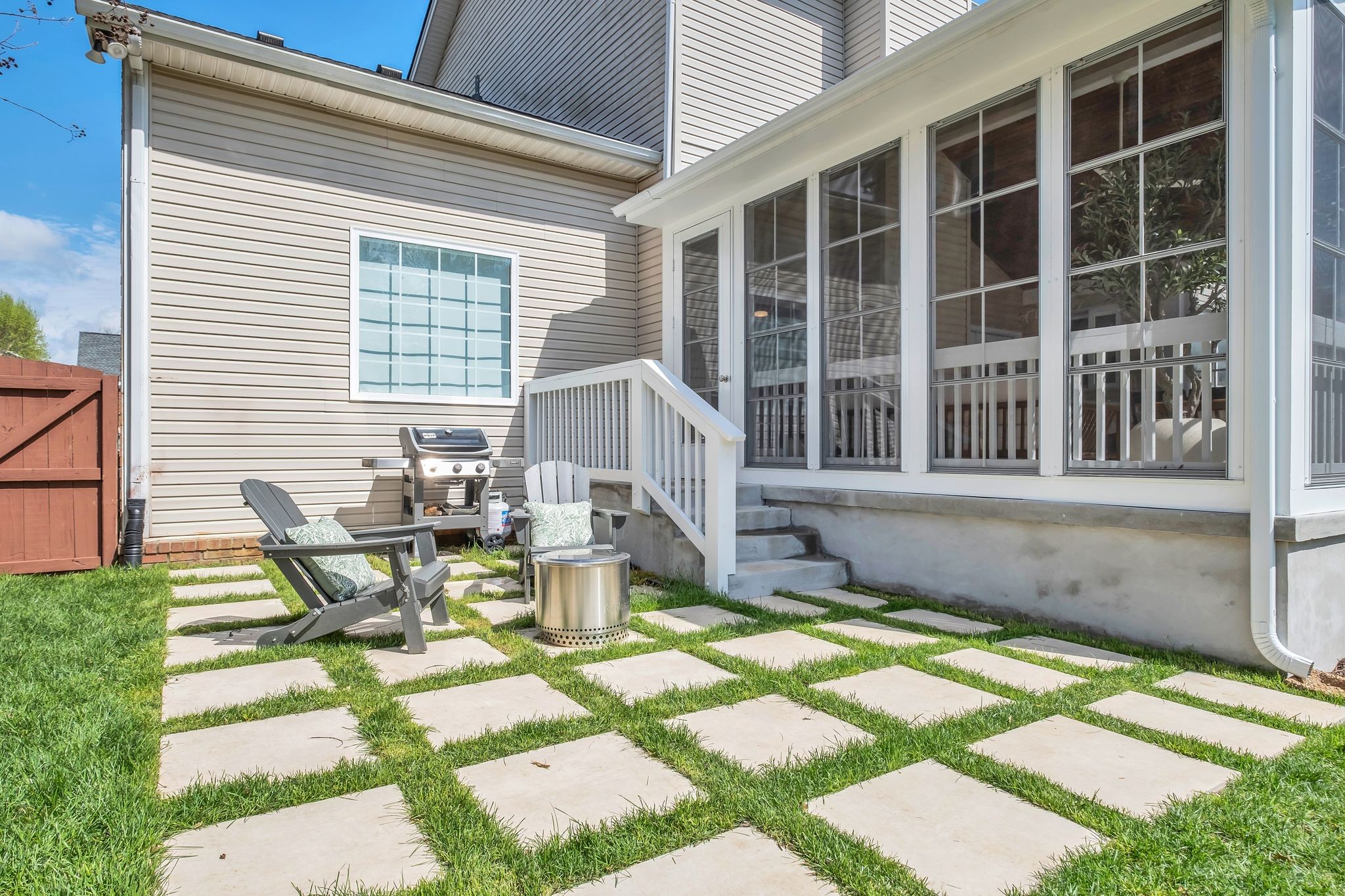 378 Logans Circle Franklin, TN 37067 - Photo 46 of 49 a view of a house with backyard sitting area and garden