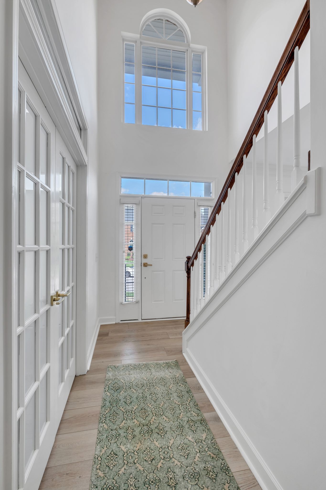 378 Logans Circle Franklin, TN 37067 - Photo 5 of 49 a view of entryway and hall with wooden floor