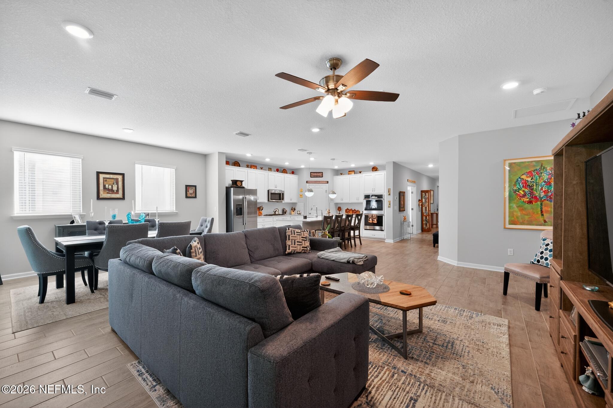 75505 Banyan Way Yulee, FL 32097 - Photo 6 of 30 a living room with furniture kitchen view and a window