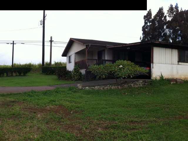 1200 Kokomo Road Haiku, HI 96708 - Photo 15 of 24 a view of a house with a yard