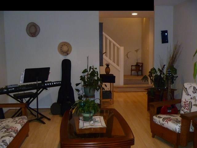 1200 Kokomo Road Haiku, HI 96708 - Photo 3 of 24 a living room with furniture and floor to ceiling window