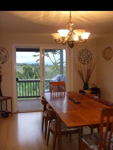 1200 Kokomo Road Haiku, HI 96708 - Photo 4 of 24 a view of a dining room with furniture window and outside view
