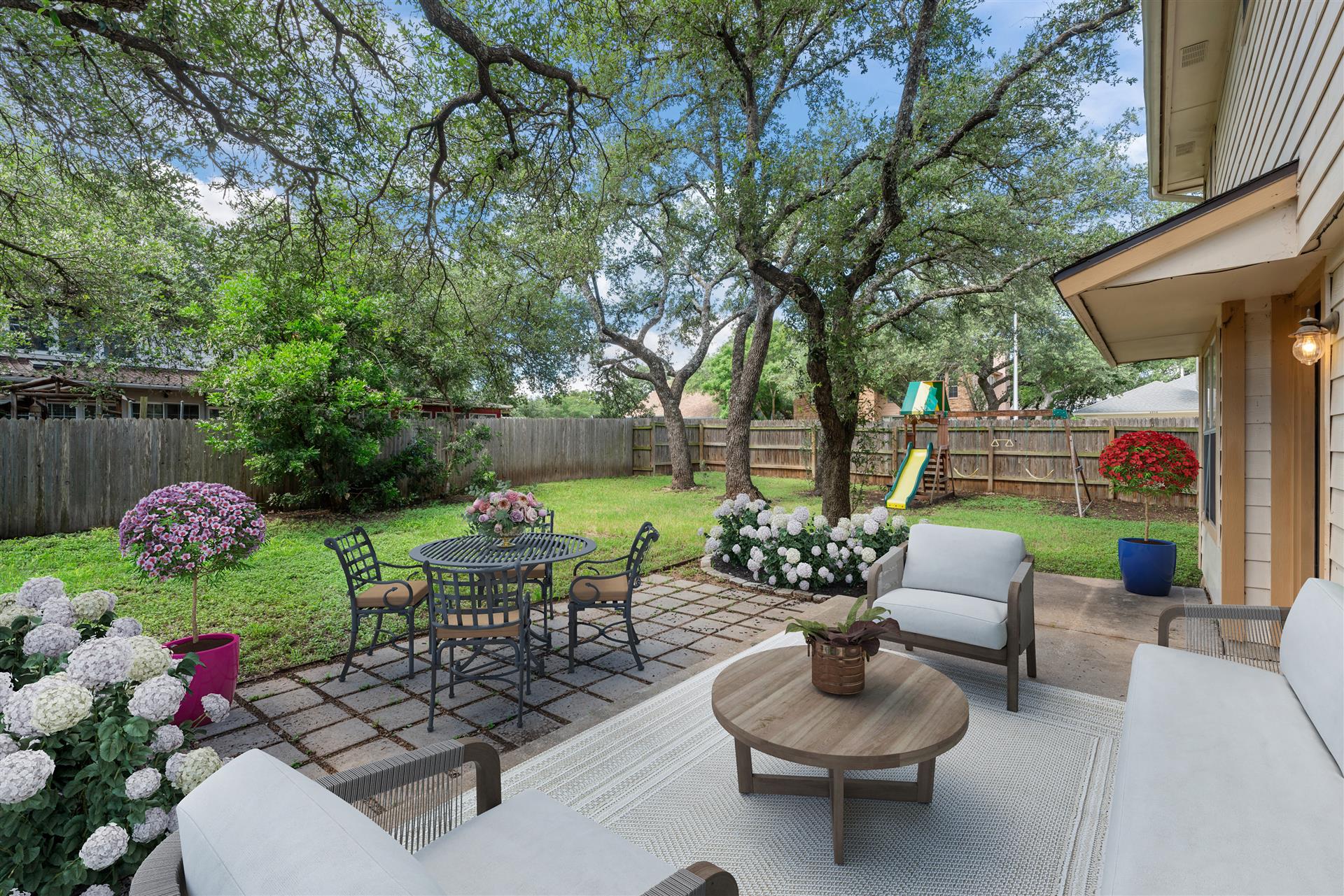 1710 Persimmon Road Cedar Park, TX 78613 - Photo 2 of 33 A generous backyard offers both a patio for entertaining and ample green space for recreation. - perfect for kids to play and your four-legged family members to run around.