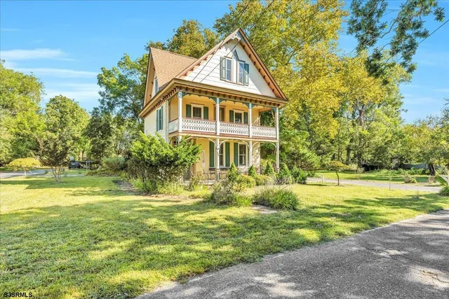 a front view of house with yard