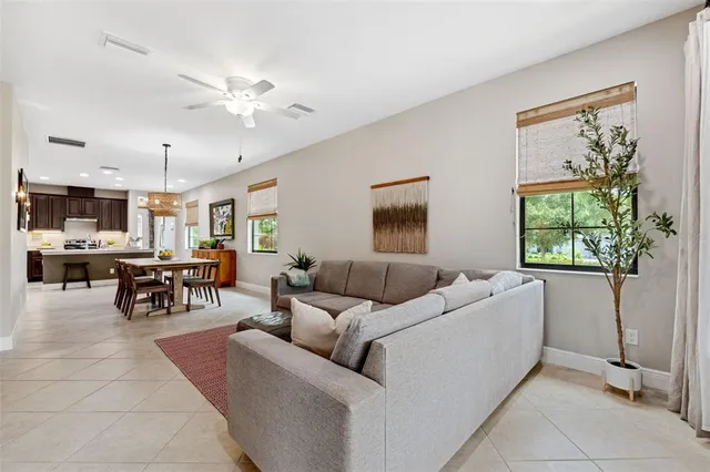 a spacious bedroom with a bed and window