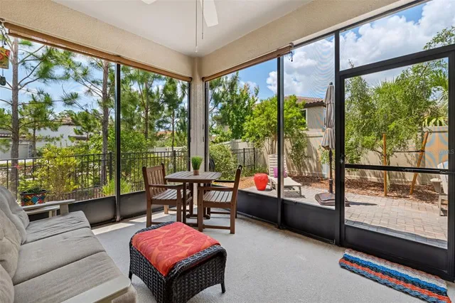 a spacious bedroom with a bed and a couch