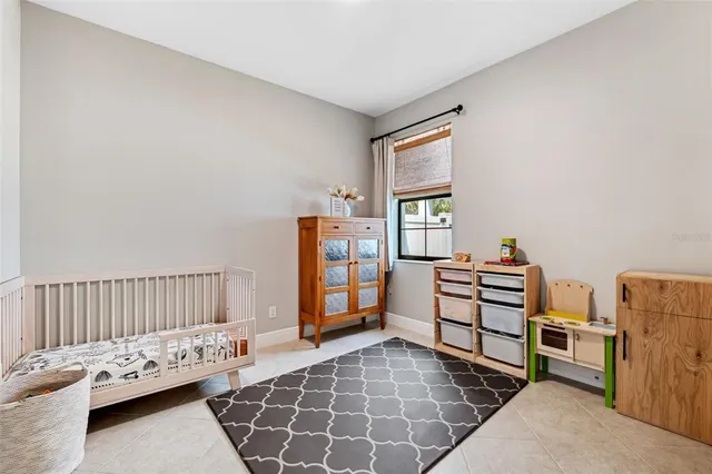 a front view of a house with yard and green space