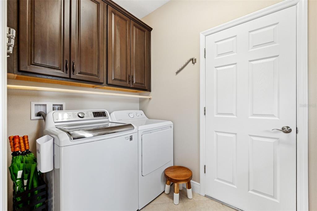 3877 Burdick Loop Odessa, FL 33556 - Photo 34 of 64 a utility room with dryer and washer