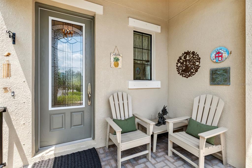 3877 Burdick Loop Odessa, FL 33556 - Photo 4 of 64 a living room with furniture and a window