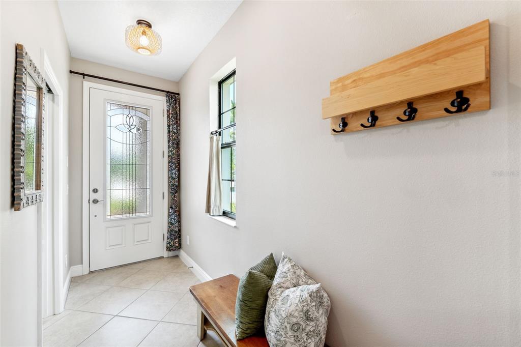 3877 Burdick Loop Odessa, FL 33556 - Photo 5 of 64 a view of livingroom with furniture and windows