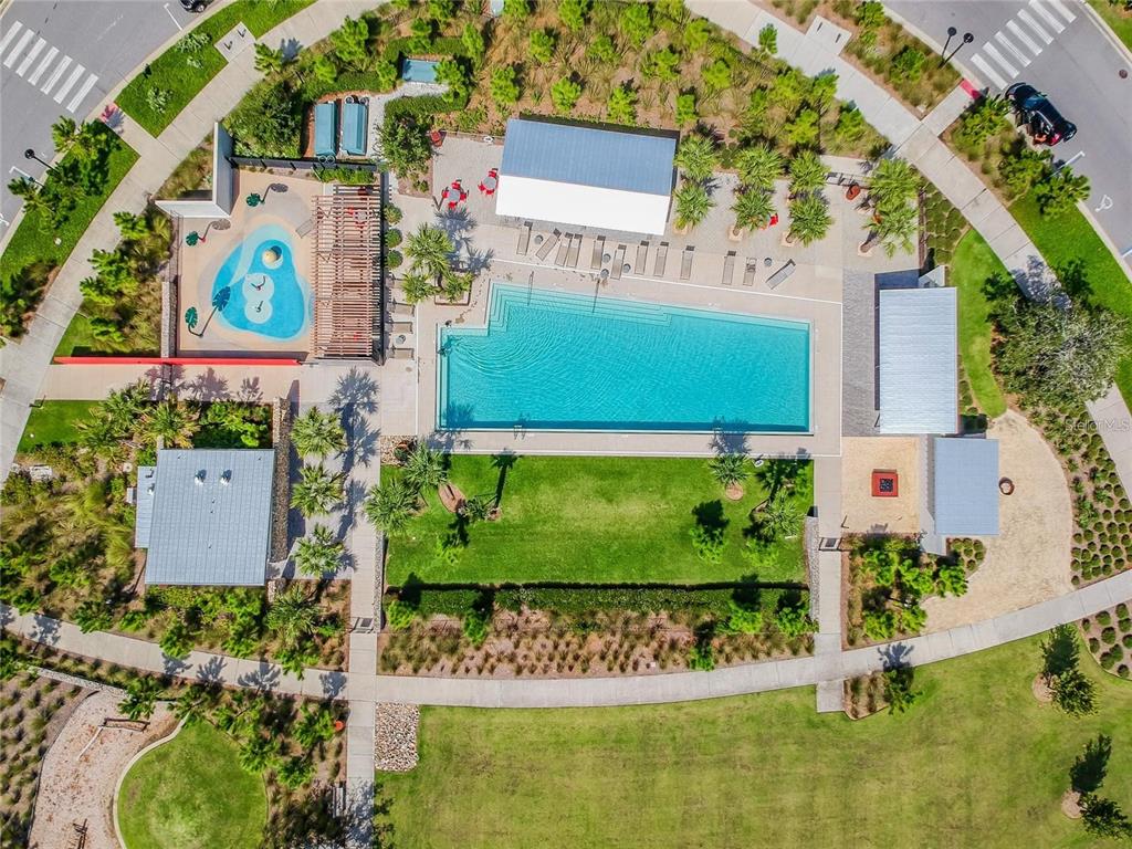 3877 Burdick Loop Odessa, FL 33556 - Photo 53 of 64 an aerial view of a house with a garden and swimming pool