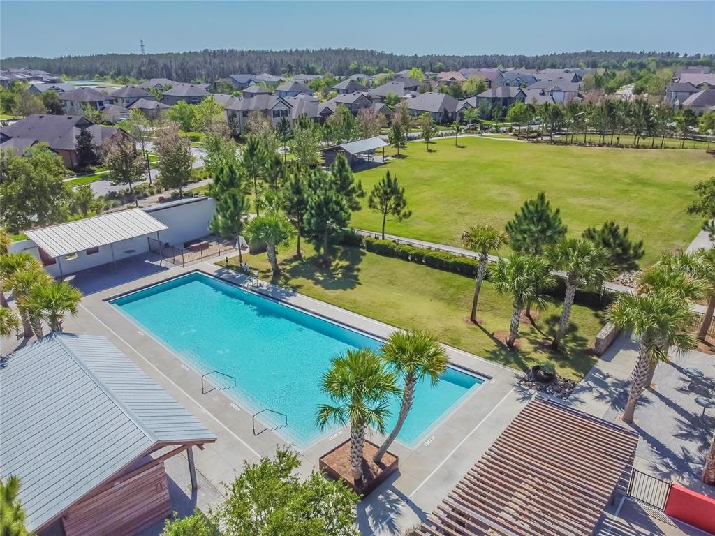 3877 Burdick Loop Odessa, FL 33556 - Photo 54 of 64 an aerial view of a houses with a lake view