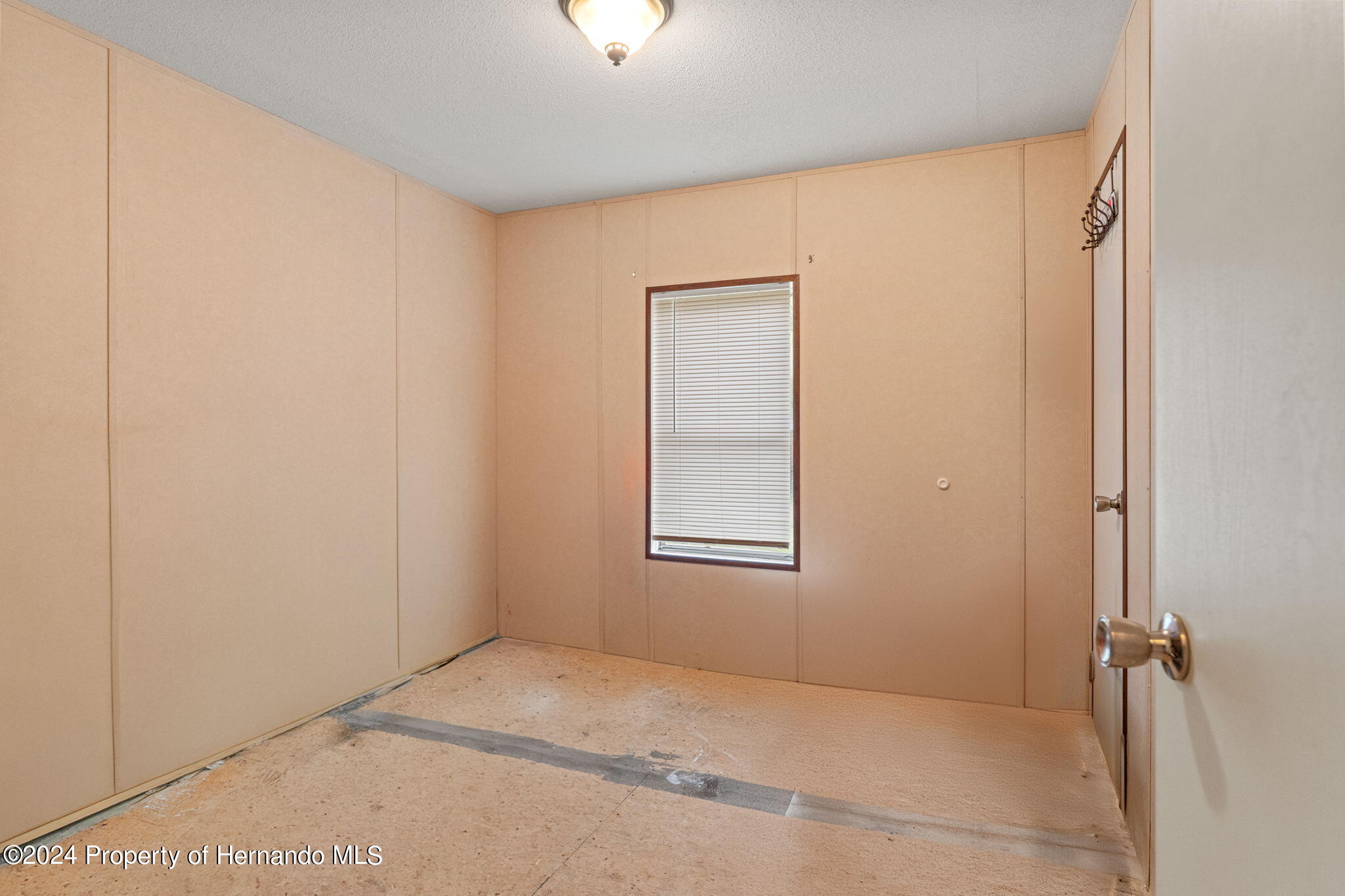 935 South Crystal Grove Point Homosassa, FL 34448 - Photo 12 of 23 a view of an empty room with a window