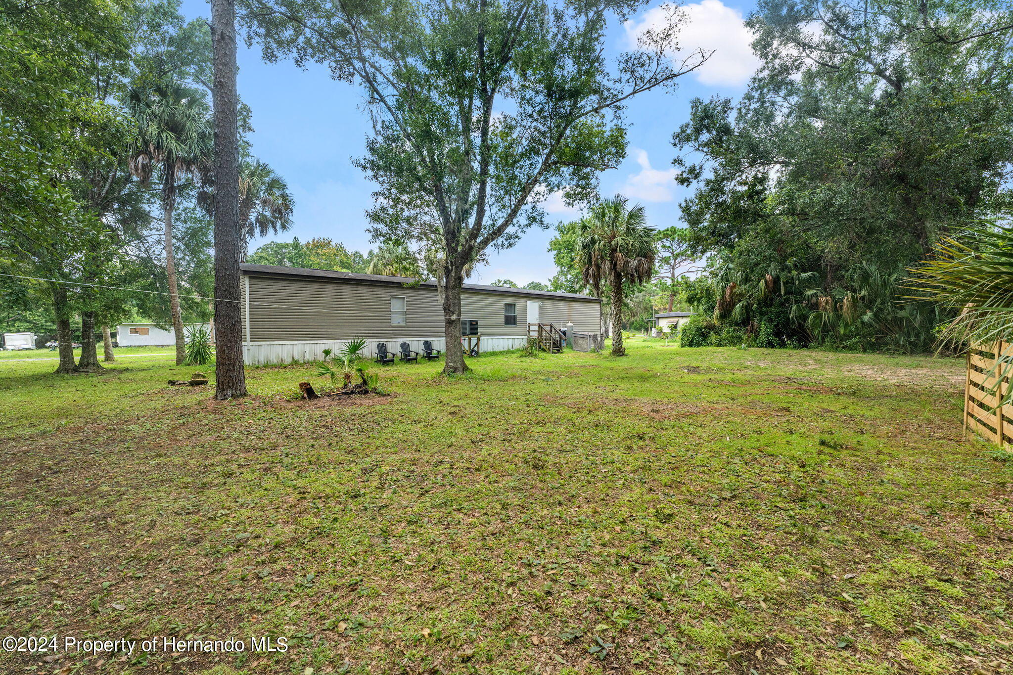 935 South Crystal Grove Point Homosassa, FL 34448 - Photo 20 of 23 a view of a house with a yard