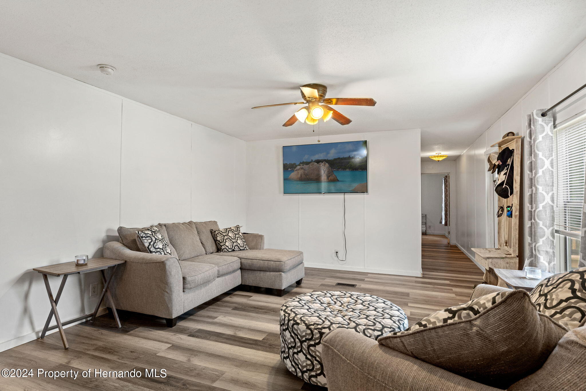 935 South Crystal Grove Point Homosassa, FL 34448 - Photo 4 of 23 a living room with furniture and wooden floor