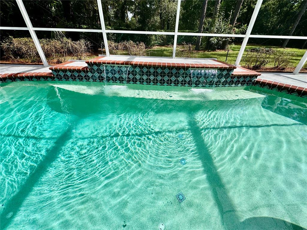 5688 Legend Hills Lane Spring Hill, FL 34609 - Photo 5 of 74 a view of yard with furniture and garden